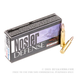 20 Rounds of .223 Ammo by Nosler Defense Ammunition - 64gr Bonded Flat Base SP